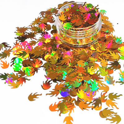 Glitter de poliéster a granel en forma de llama para otros suministros navideños y glitter a granel en forma de fuego
