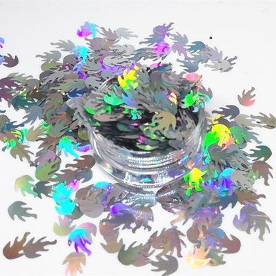 Glitter de poliéster a granel en forma de llama para otros suministros navideños y glitter a granel en forma de fuego